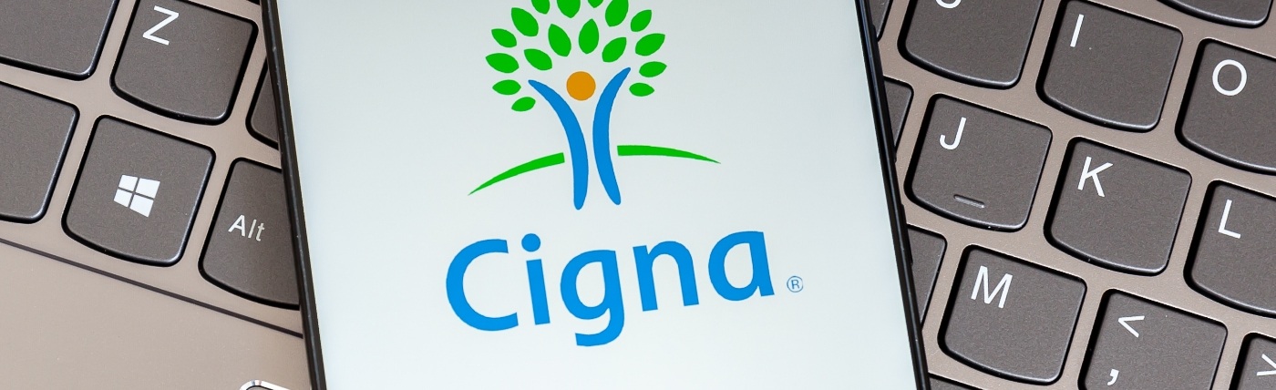 Phone screen showing logo for Cigna dental insurance in Waco