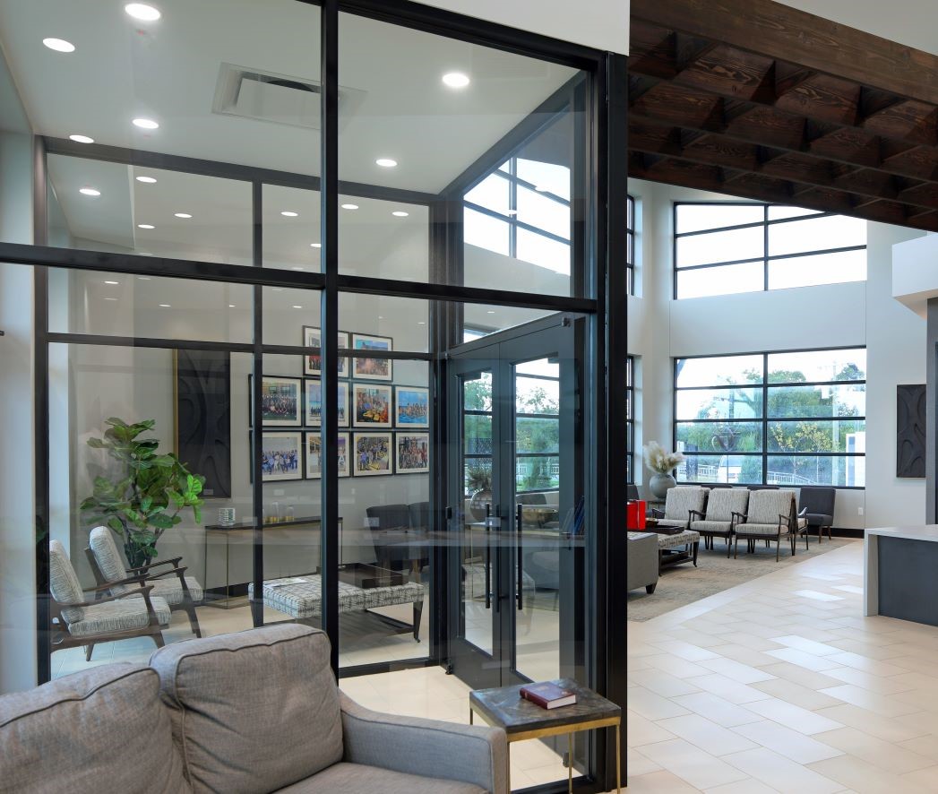 Glass doors leading to dental office reception area
